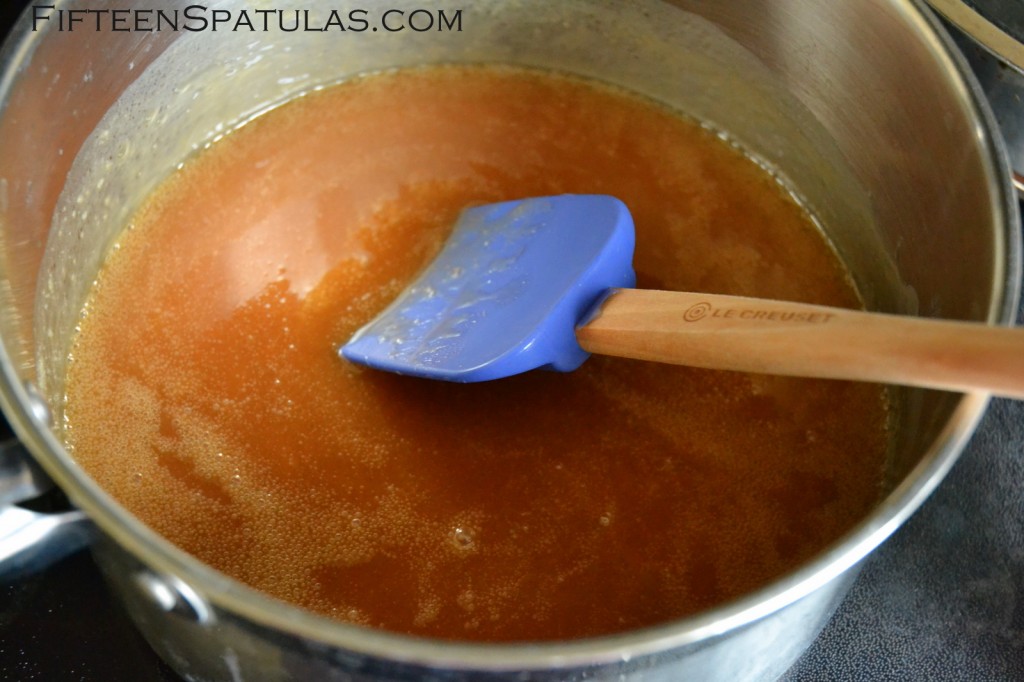 Sea Salt Caramel Recipe Shown in Stainless Steel Saucepan with Blue Spatula