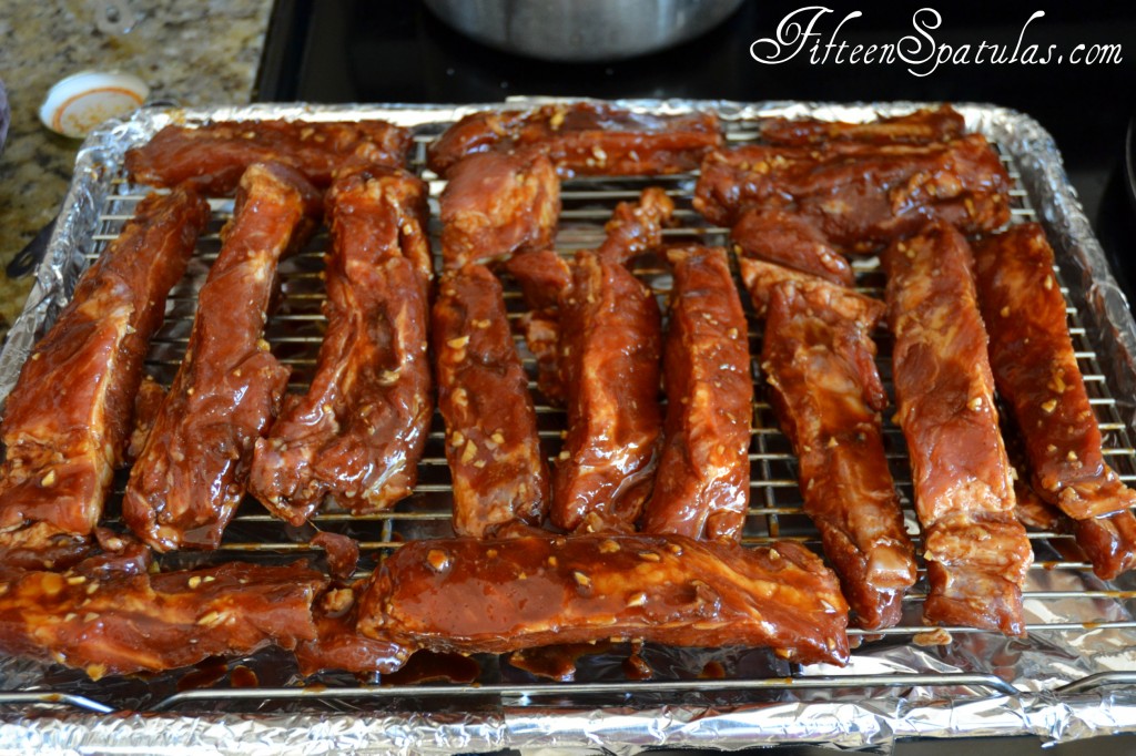 Individual Spare Ribs on Rack Basted in Chinese BBQ Sauce