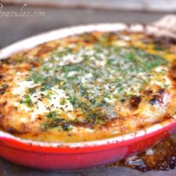 Baked Eggs with Herb Mixture on Top