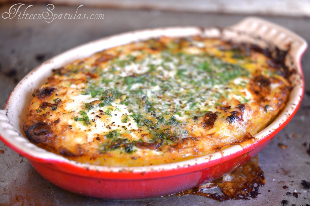 Baked Eggs - In Red Dish with Parmesan and Herbs