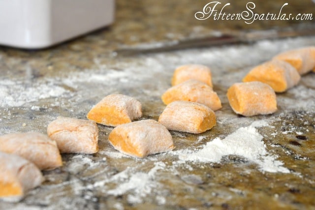 Sweet Potato Gnocchi Pieces Cut on Floured Countertop