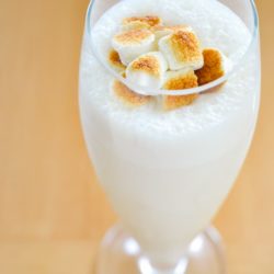 Malted Milkshake In Tall Glass With Toasted Marshmallow and Vanilla Ice Cream