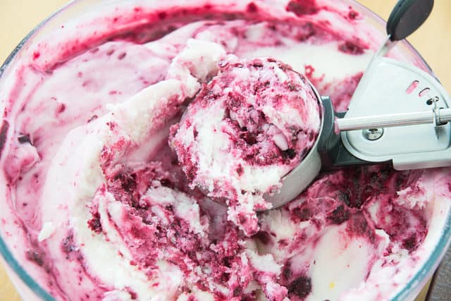 Raspberry Frozen Yogurt - With Ice Cream Scoop Cutting Through