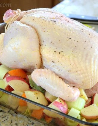 Classic Roast Chicken on a Bed of Vegetables