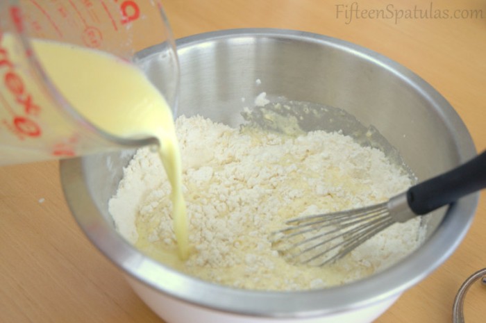 Combining Waffle Ingredients with Dry and Wet in Mixing Bowl