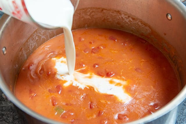 Pouring Cream Into Tomato Bisque