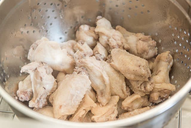 Drained Parboiled Wings in Colander