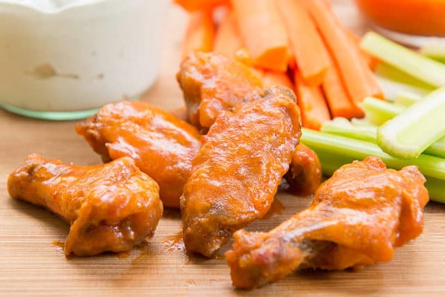 Baked Chicken Wings In the Oven Cooked and Tossed with Buffalo Sauce 