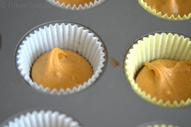 peanut butter cups dolloped into muffin wells