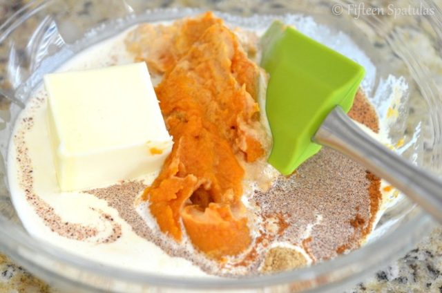 pumpkin spice, puree, butter, and cream added to caramel mixture