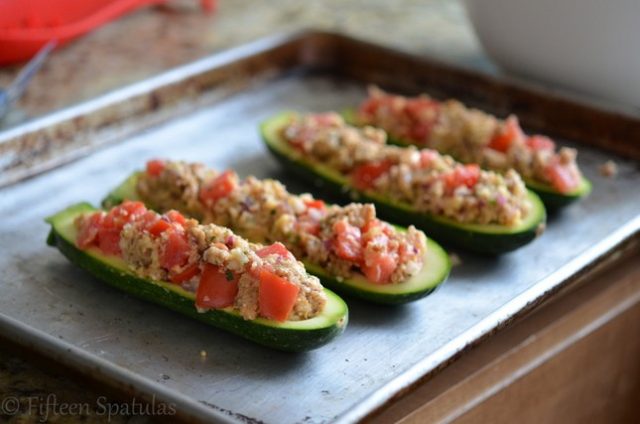 Zucchini Boats on a Sheet Pan with Unbaked Sausage Stuffing Inside