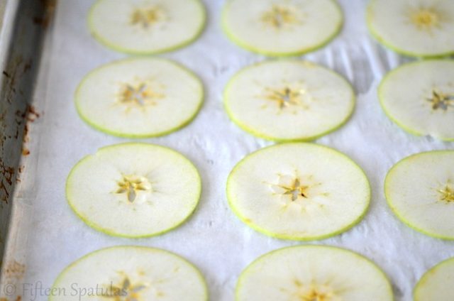 Thinly Sliced Granny Smith Apple Slices on Parchment