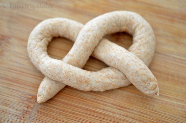 how to shape a soft pretzel raw on cutting board