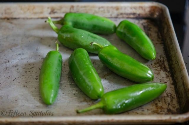jalapenos on a roasting tray for cheese crackers