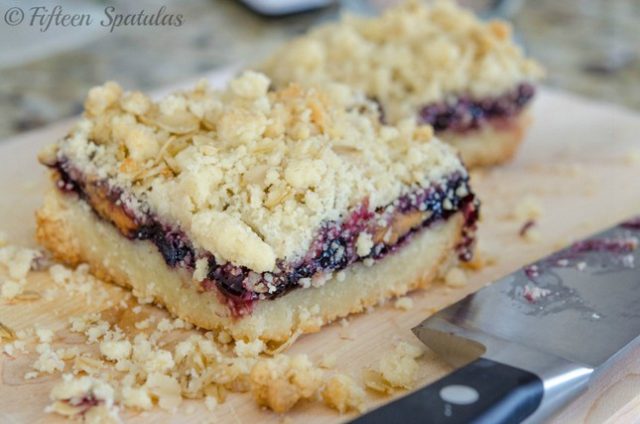 peanut butter and jelly shortbread bars on cutting board
