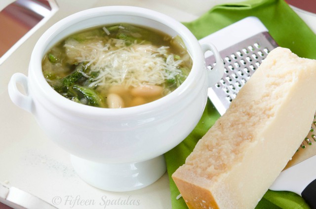 White Bean and Escarole Soup - In Soup Bowl with Parmesan on Top
