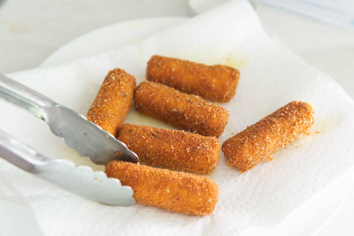 Freshly Deep Fried Cheese Sticks on a Paper Towel