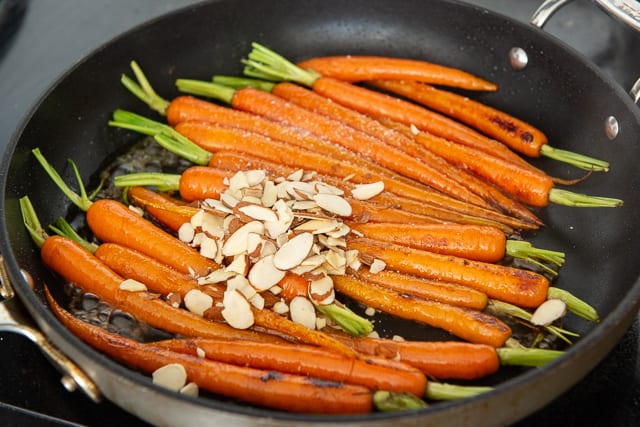Trimmed Carrots with Almonds and Sea Salt Sprinkled on Top - Carrot Recipes for Easter