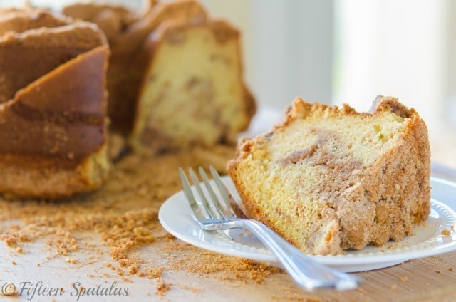 Cinnamon Crumb Coffee Cake - With One Slice on Plate and the Rest in Background