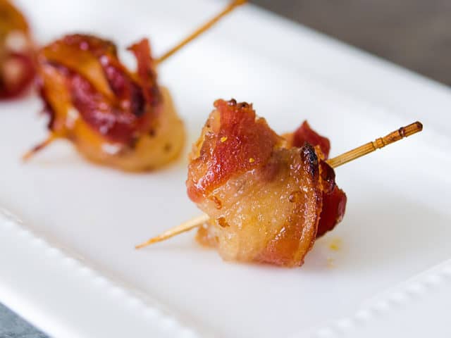 Rumaki on White Platter with Bacon and toothpick