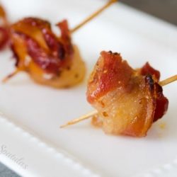 Bacon Wrapped Water Chestnuts On White Platter with Toothpicks