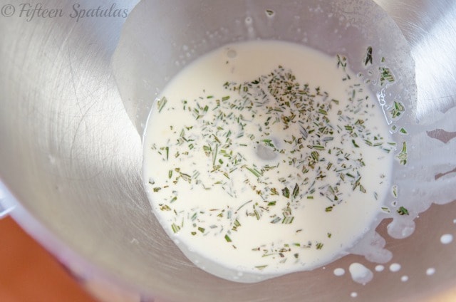 Heavy Cream in Mixing Bowl with Herbs