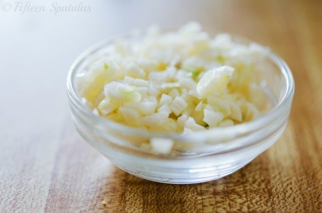 minced garlic in glass bowl