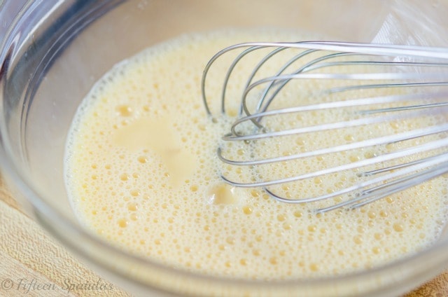 Whisked Eggs and Milk Mixture in Glass Bowl