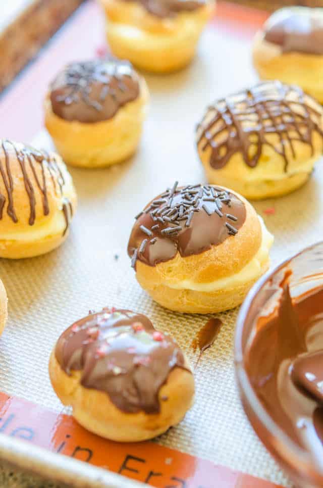Cream Puff Recipe on Silicone Mat with Chocolate and Sprinkles 
