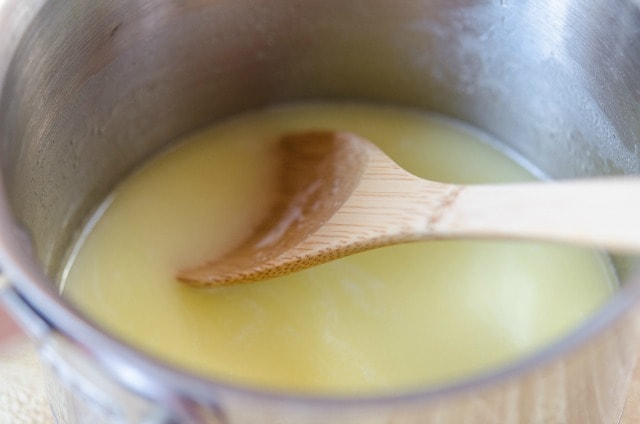 Melted butter and water in saucepan