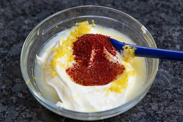 Creme Fraiche with Pepper Flakes and Lemon in bowl