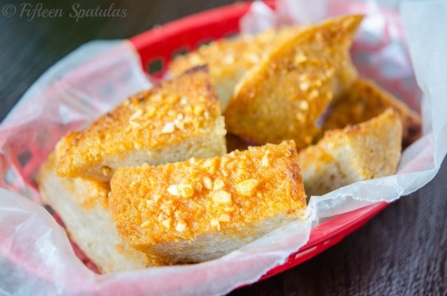 Sriracha Cheese Bread - In Red basket with Wax paper