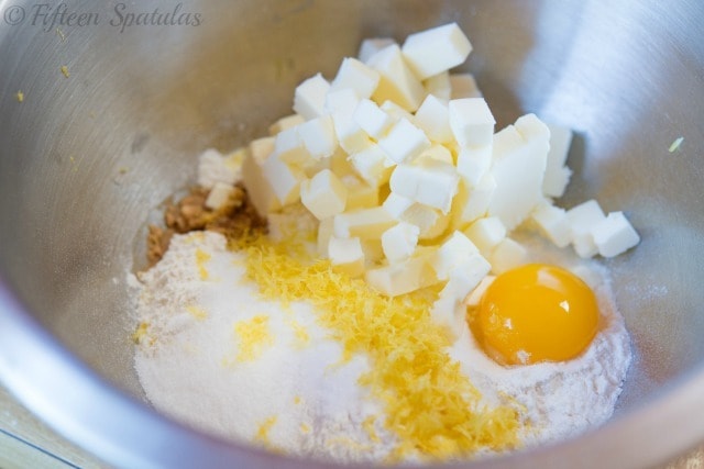 Butter, Lemon Zest, Egg Yolks, and Dry Ingredients in Mixing Bowl
