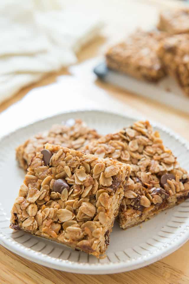 Chocolate Chip Granola Bars on a White Plate in Squares
