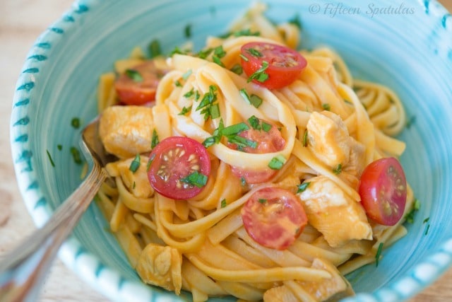 Buffalo Chicken Fettuccine Recipe in Bowl with Tomato and Herbs