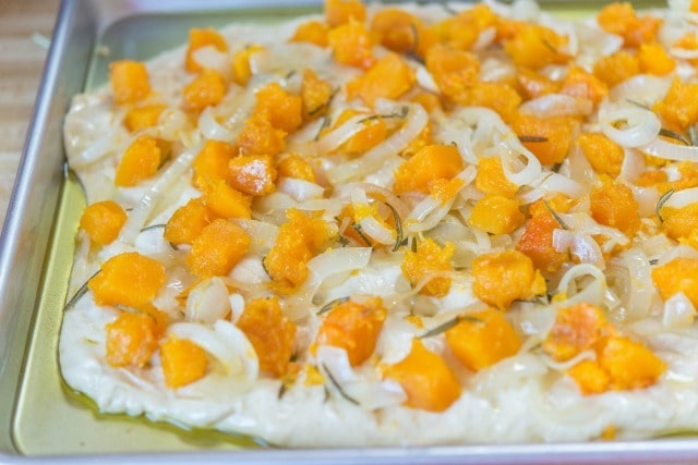 Butternut Squash Cubes and Rosemary on Raw Focaccia Dough