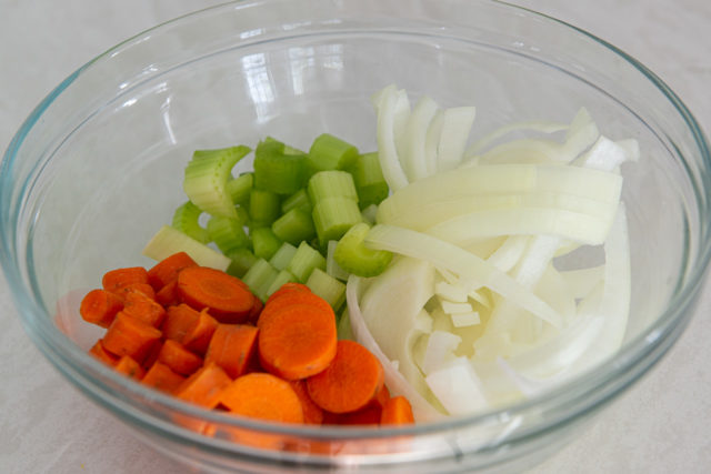 Sliced Carrots, Celery, and Onion in Mixing Bowl