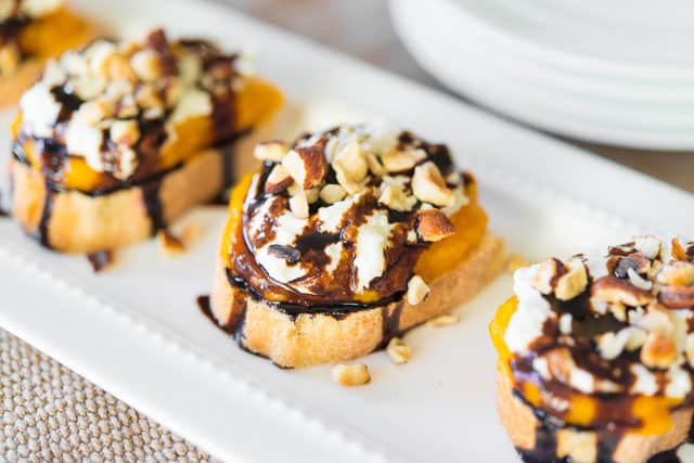 Butternut Squash Crostini - On White Plate with ricotta and balsamic on top
