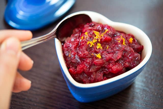 Thanksgiving Cranberry Sauce Recipe - Served in a Blue Heart Dish with Orange Zest