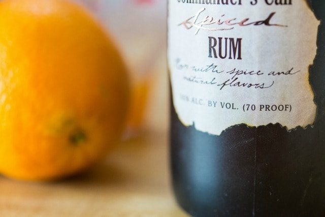 Spiced Rum and Oranges on a Wooden Board