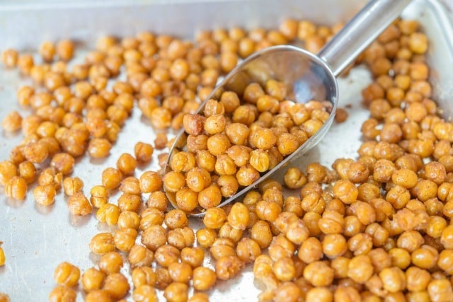 Lightly Roasted Chickpeas on Pan with Metal Scoop