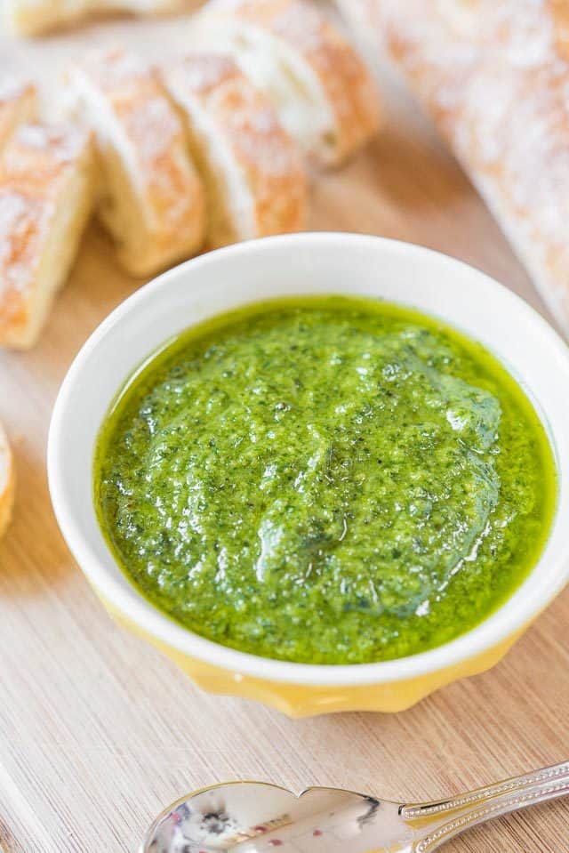 Basil Pesto - in Bowl with Baguette Slices on Board