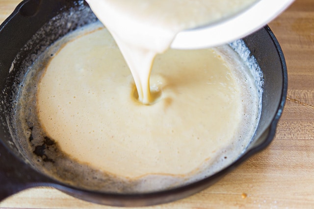 Pouring Pancake Batter Into Hot Butter