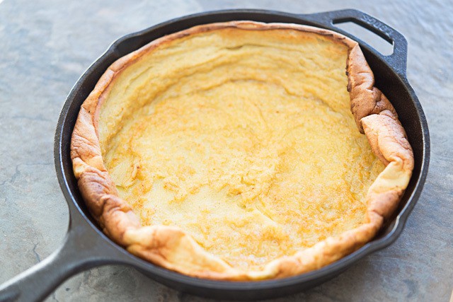 Dutch Baby Pancake Puffed Up in Cast Iron Skillet