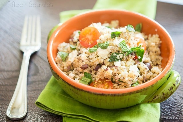 A bowl of quinoa salad on a table