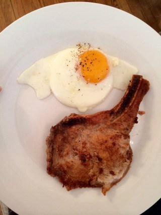 Breakfast Pork Chop with Egg on Plate