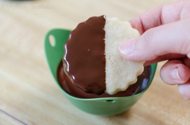 Dipping Half of Cookie Into Melted Chocolate