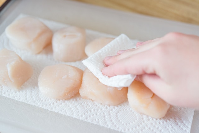 Patting Scallops Dry With Paper Towel 