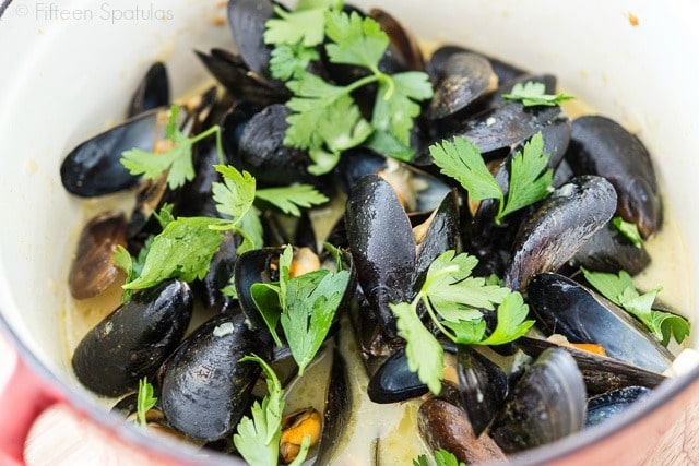 Green Curry Mussels - In Red Dutch Oven Topped with Herbs