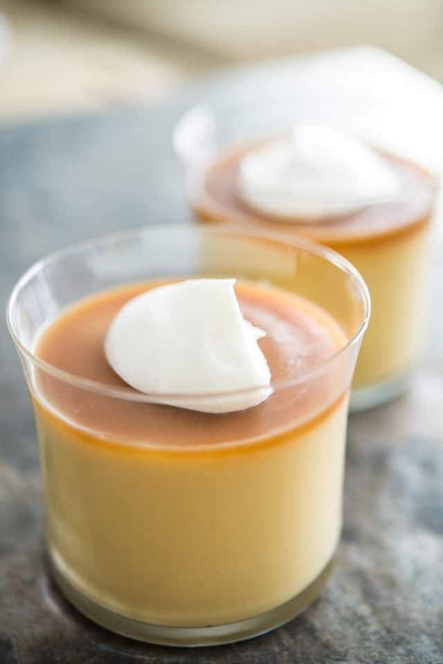 Budino - in Two Glasses with Butterscotch Sauce and Dollop of Cream
